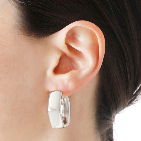 Woman wearing Italian Sterling Silver Polished Electroform Hexagon Hoop Earrings