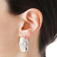 Load image into Gallery viewer, Woman wearing Italian Sterling Silver Polished Electroform Hexagon Hoop Earrings
