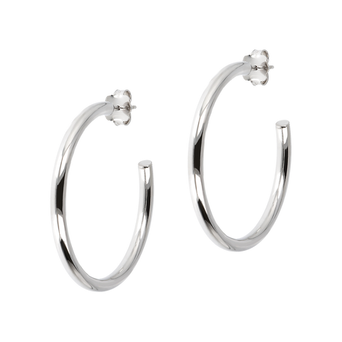 Classic sterling silver hoop earring for pierced ears.  smooth and shiny, with butterfly clutch backs  1.5" in size.