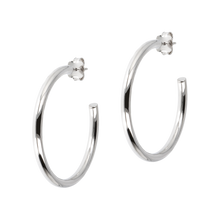 Load image into Gallery viewer, Classic sterling silver hoop earring for pierced ears.  smooth and shiny, with butterfly clutch backs  1.5&quot; in size.
