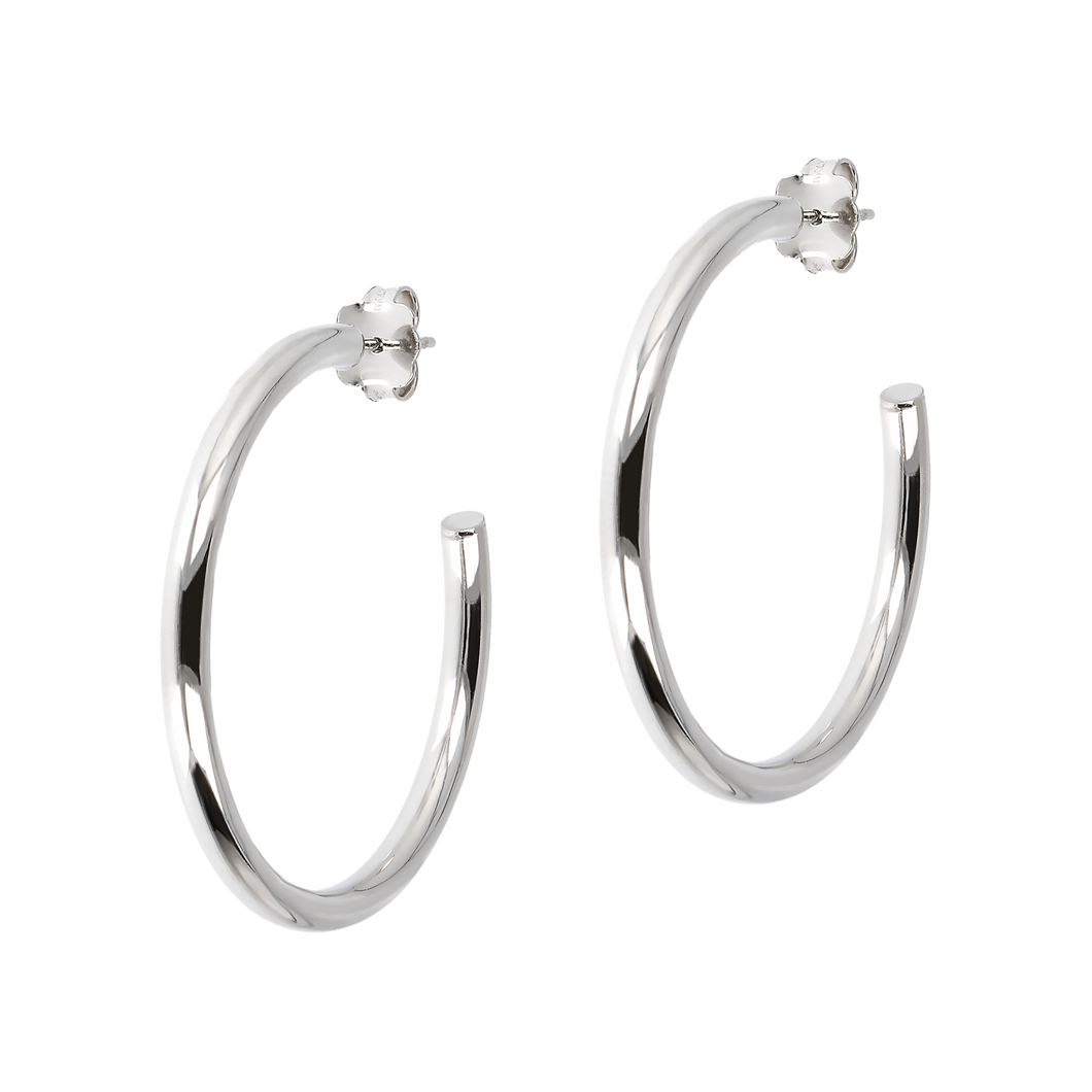 Classic sterling silver hoop earring for pierced ears.  smooth and shiny, with butterfly clutch backs  1.5