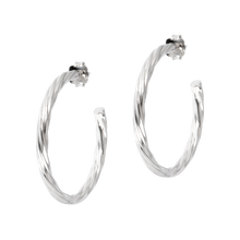 Load image into Gallery viewer, A 1.5&quot; sterling silver hoop earring. Twisted for texture, but high polished for shine.  Butterfly clutch backs. for pierced ears only.  Made in Italy
