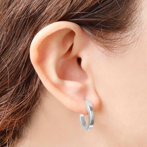 Italian Sterling Silver 3/4" Polished Square Tube Hoop Rhodium Earrings in an ear